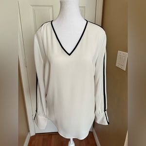 Chico’s size 1 (M) white with black trim on sleeves and colar neck